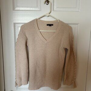 American Eagle Cream Sweater with braids down sleeves